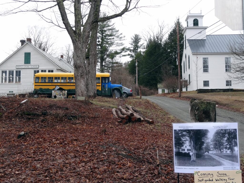 Westminster West Church and old schoolhouse shown in 2021 with the c1920 Harry Chapman photo displayed in foreground